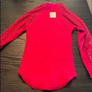Hot pink tight fitting free people top.